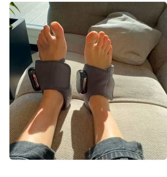Person relaxing with EMSense device on